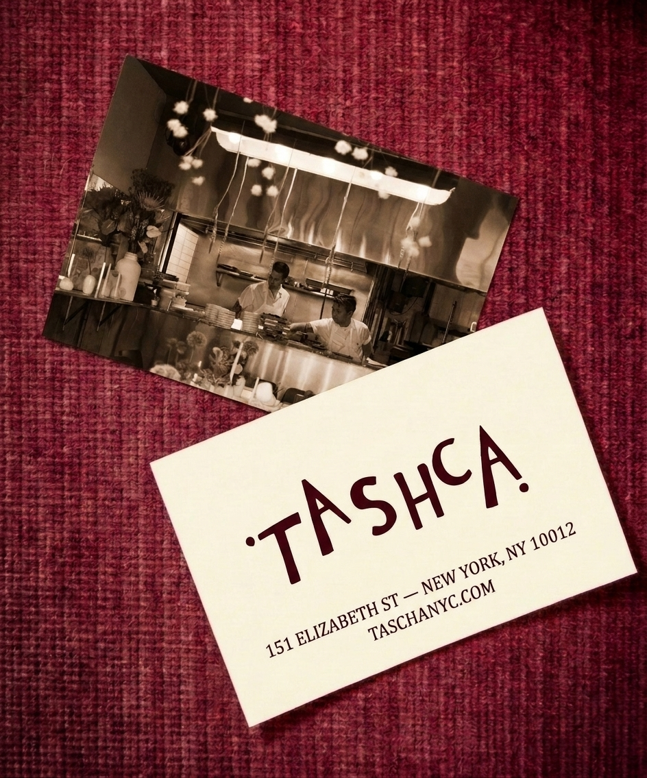 TASHCA gift card on deep red linen